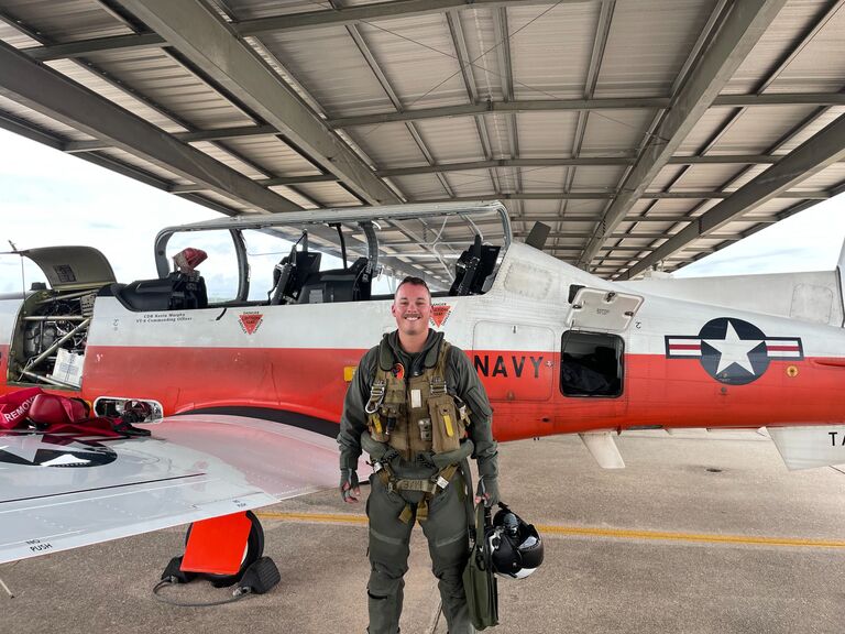 Connor solos in the T-6. 