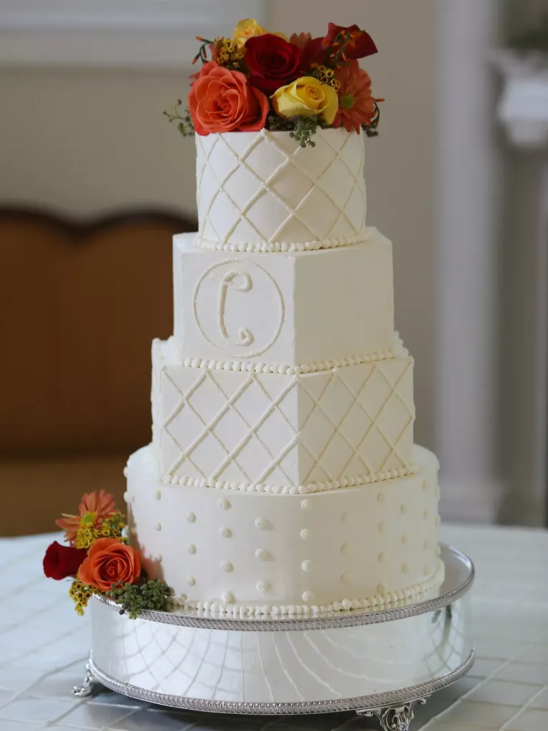 Hexagonal Wedding Cake With Fall Flower Topper