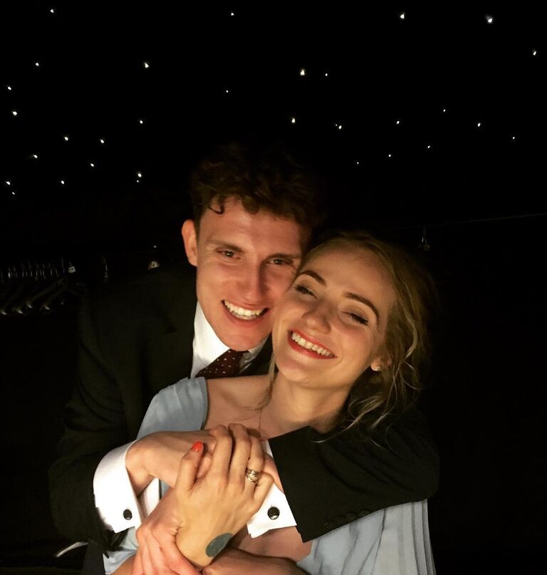 Amy and Declan attending their first wedding together.