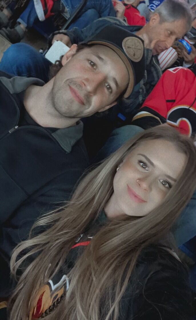 Raynie took Marc to a Flames Game on their first date