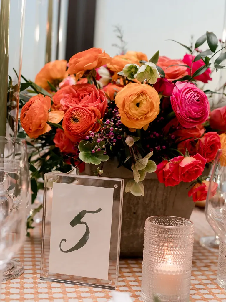 Bright Spring Centerpiece with Ranunculus and Roses
