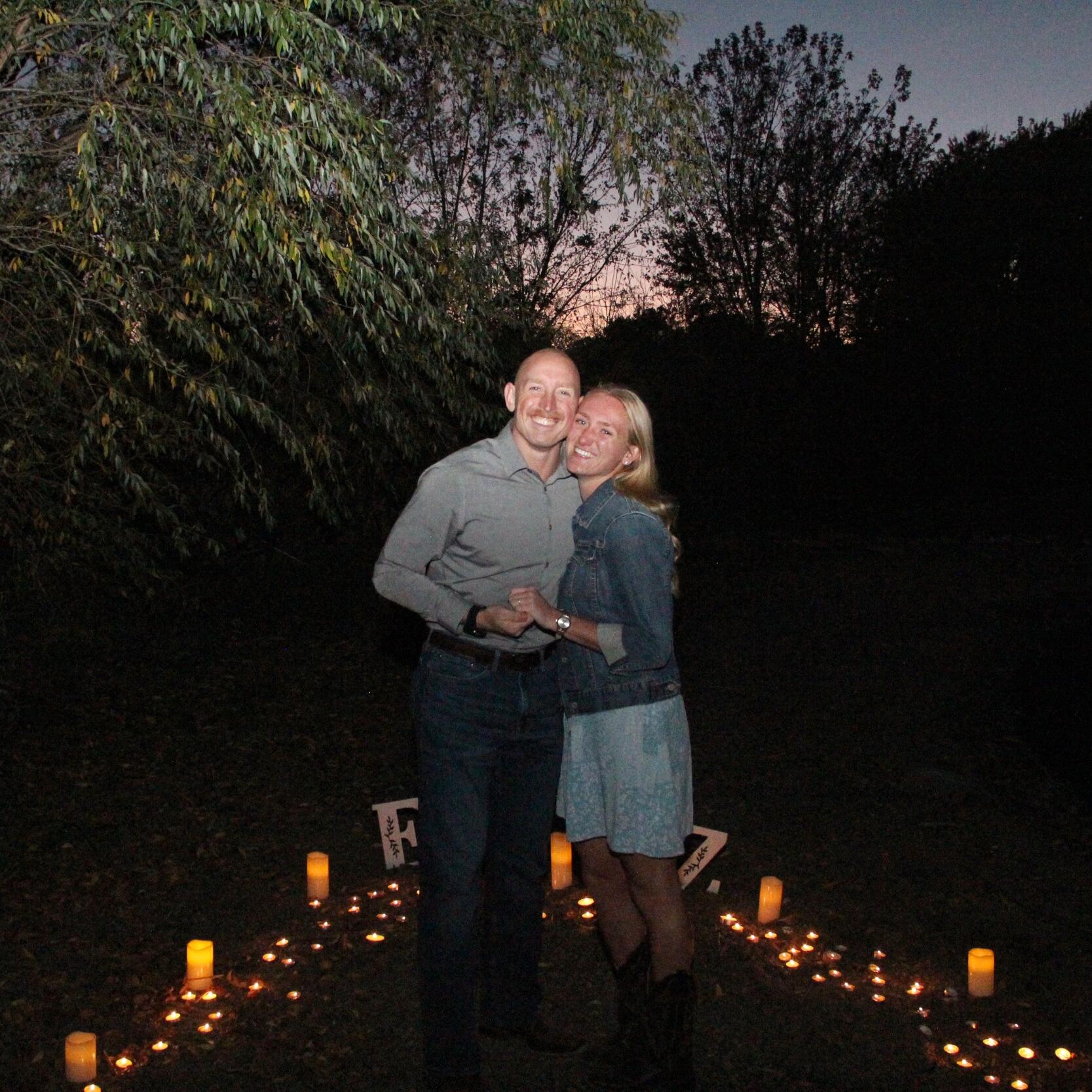 We got engaged! Everyone was in on the secret and both of our families were in town for a home meet and football game. What a good day :)