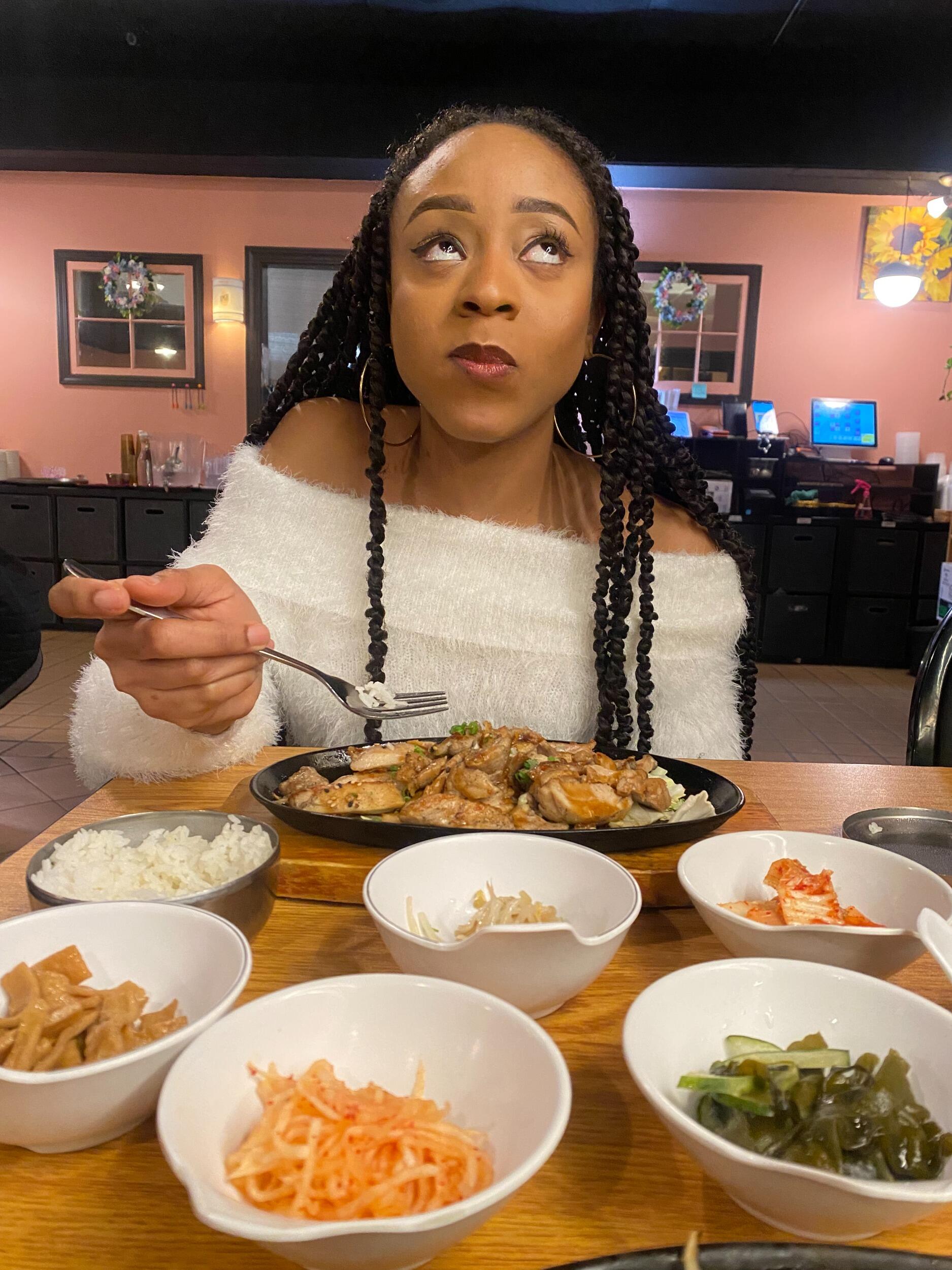 Our first dinner date at Kimchi restaurant, and there she was, shoveling food into her mouth like it was her last meal. Just minutes earlier, she was in a full panic because she'd forgotten her phone in the Uber. But hey, nothing fixes a crisis like a good meal! :)