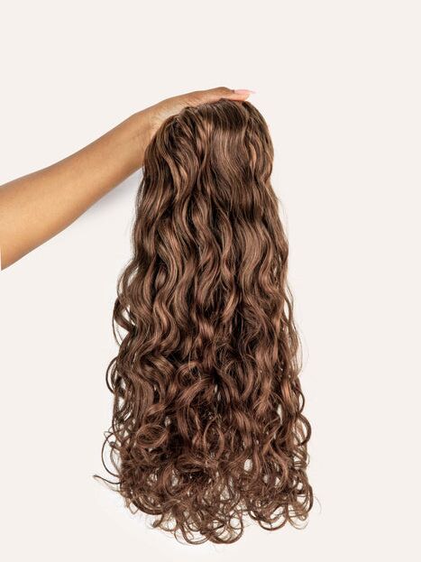 Curly clip-in hair extensions by Bebonia. 