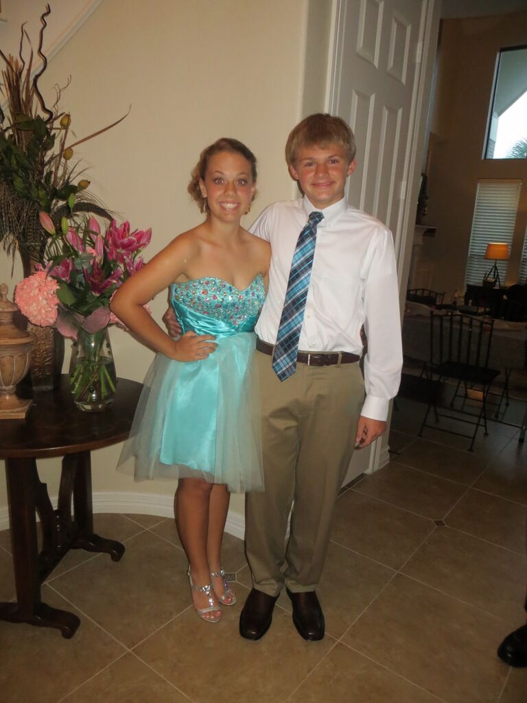 At freshman year homecoming. Many more school dances were in our future! 