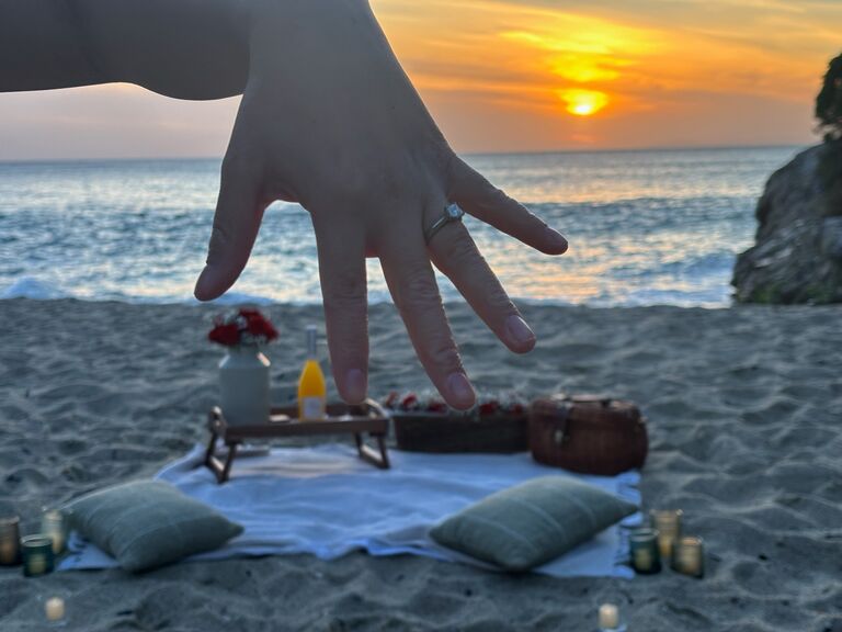 We are engaged at the beach.