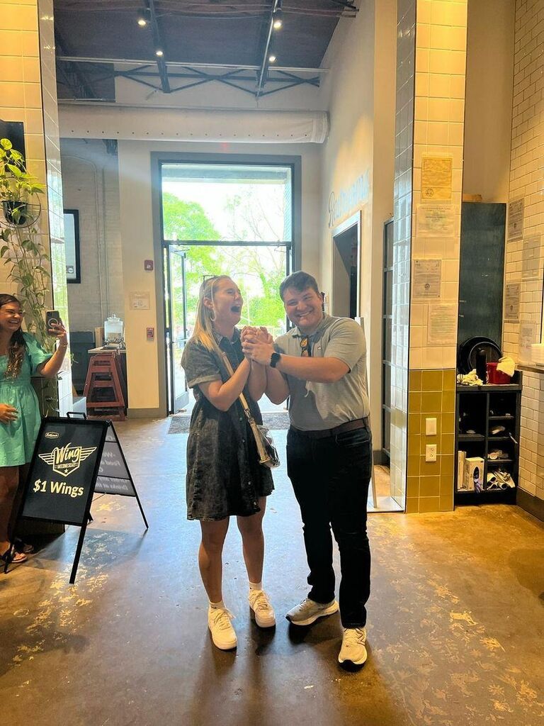 Not only was the proposal this day, but Jacob  also surprised Morgan with their families to help celebrate their engagement at the place where they first made it official!