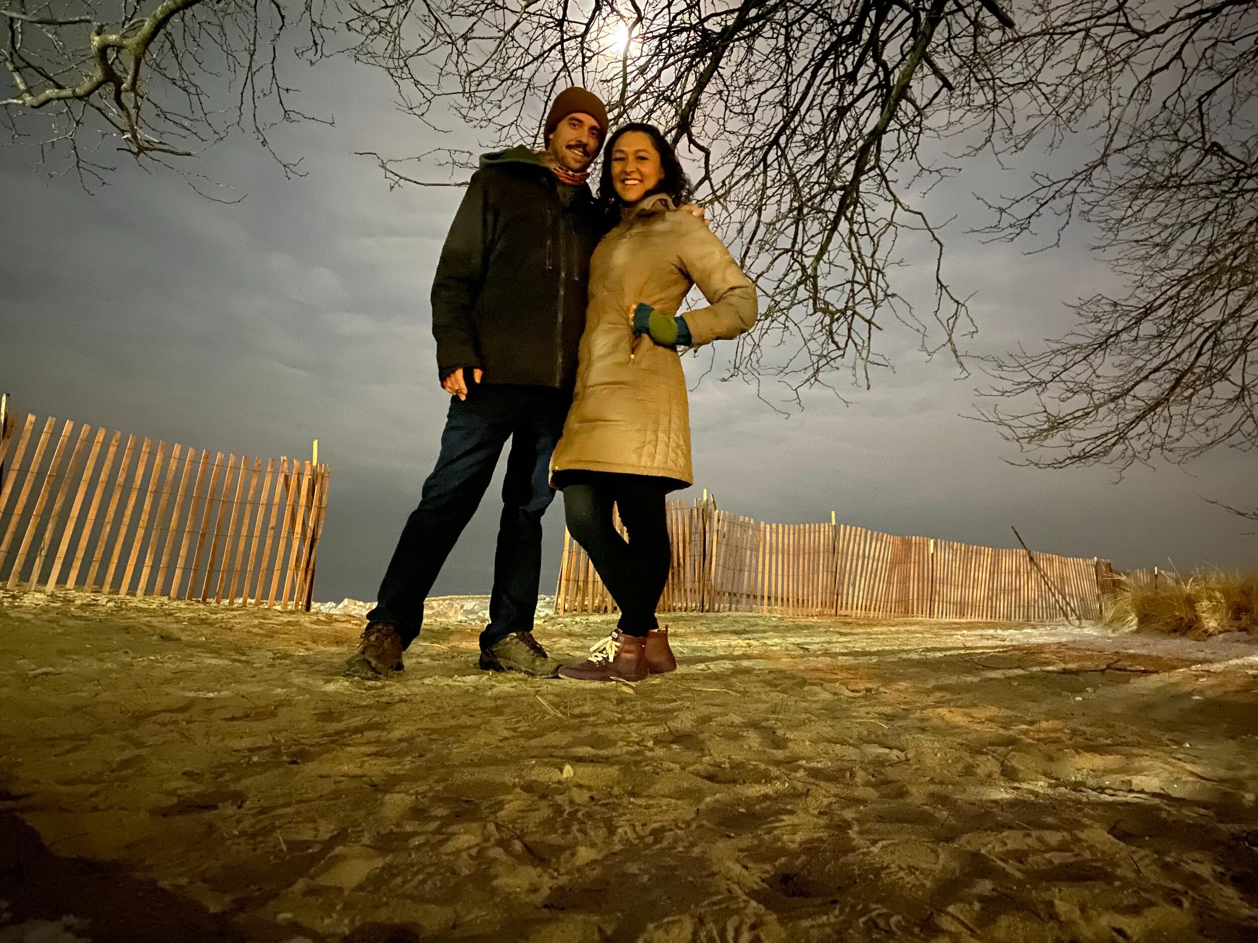 They stay up late cooking an 8 course feast on NYE and walk to their favorite beach down the street from Derek's Rogers Park apartment. 