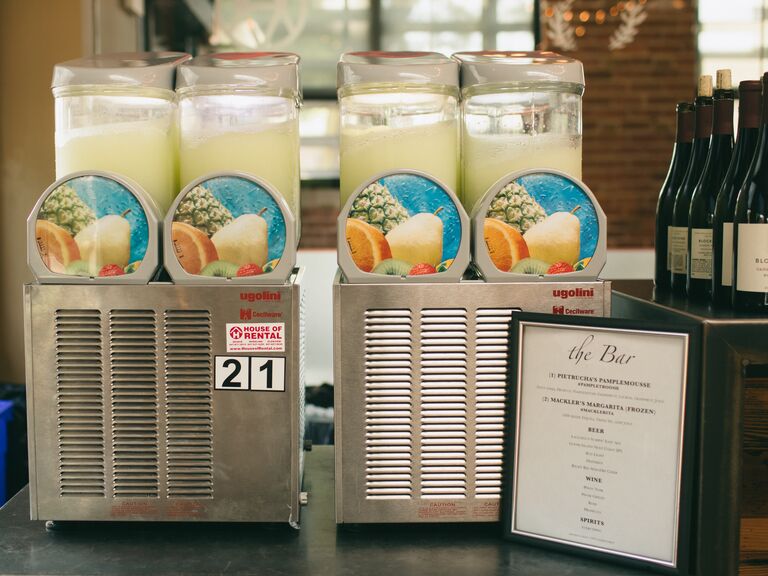 frozen margarita machines at wedding drink station