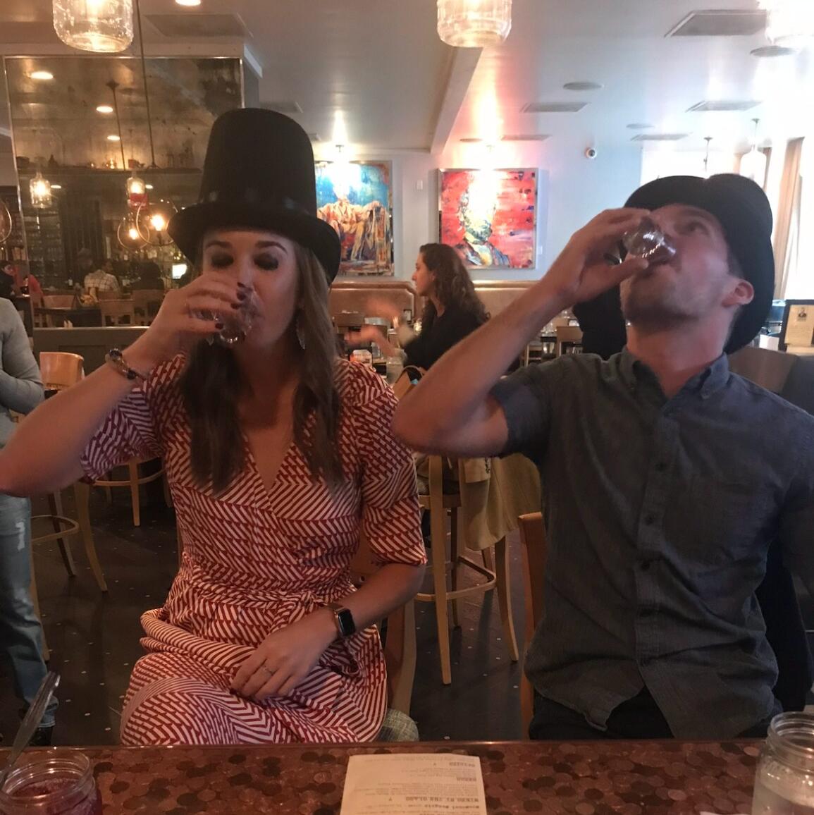 After meeting through a mutual friend at a work event in Washington, D.C. and texting non-stop for two months, Shelby and Ryan decided to make things official and started a long-distance relationship. They celebrated with a drink...or three.