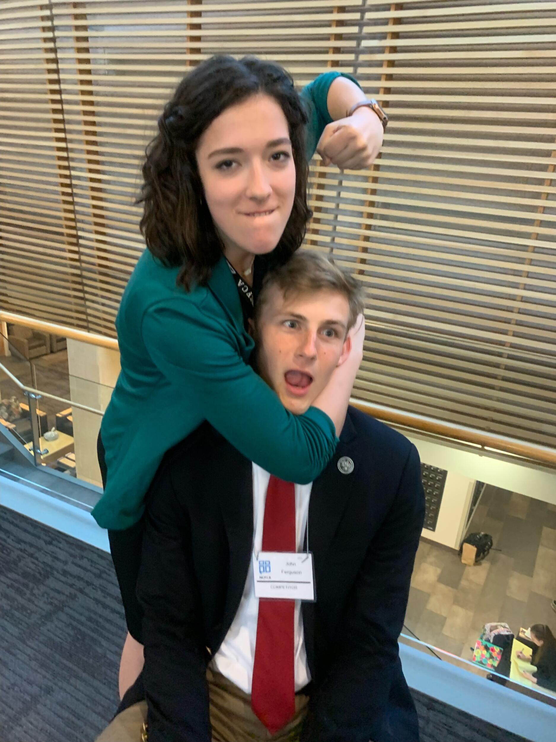 They got to know each other better through speech and debate their senior year of high school. At the NCFCA National Championship, they had to debate each other. Eliana won, but John received one of his favorite pictures in return.