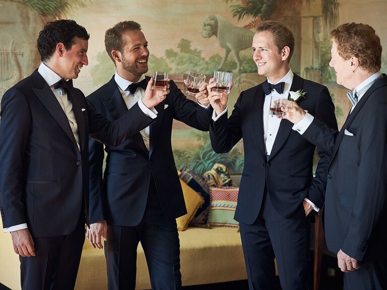 Groomsmen toasting at a wedding