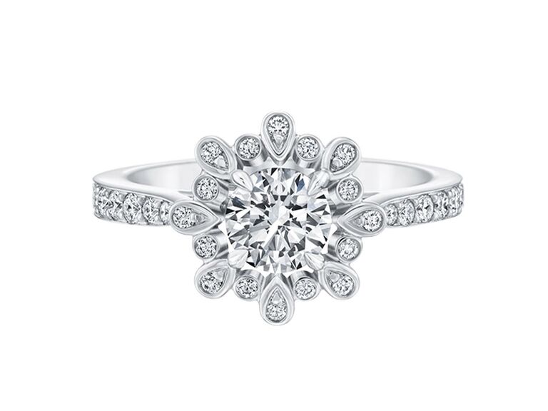 harry winston flower engagement ring with round diamond pear shaped and round diamond halo and round diamond platinum band