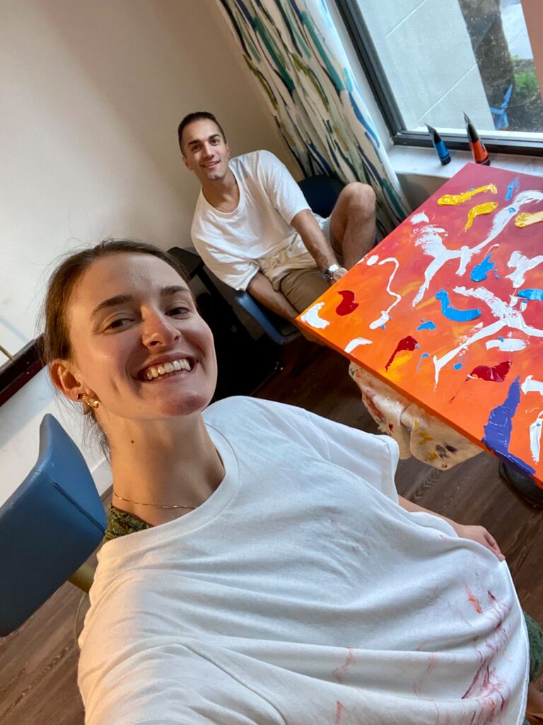 Adding a little color to Jared's apartment with some real artistic skill
