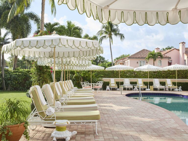 Outdoor pool deck at colony hotel in palm beach florida