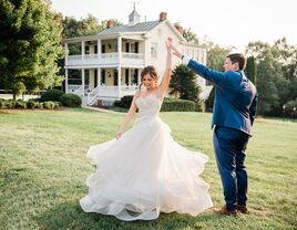 Couple dancing on the manicured ground of the b&b