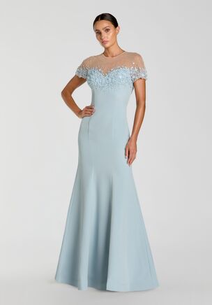 Mac Duggal
Crepe fabric (100% polyester)
Fully lined body; partially lined bodice; unlined sleeves
Illusion sweetheart neckline
Cap sleeves
Tonal pearl beading along bodice
3D floral detailing
Mermaid silhouette
Keyhole back
Concealed back zipper
Approx. 60" from top of shoulder to bottom hem
Available in Powder Blue
Style #11867