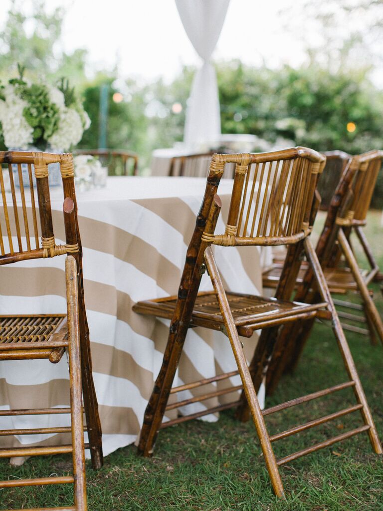 wooden bamboo folding chair at outdoor wedding reception
