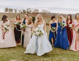 Beautiful bride walking with bridesmaids