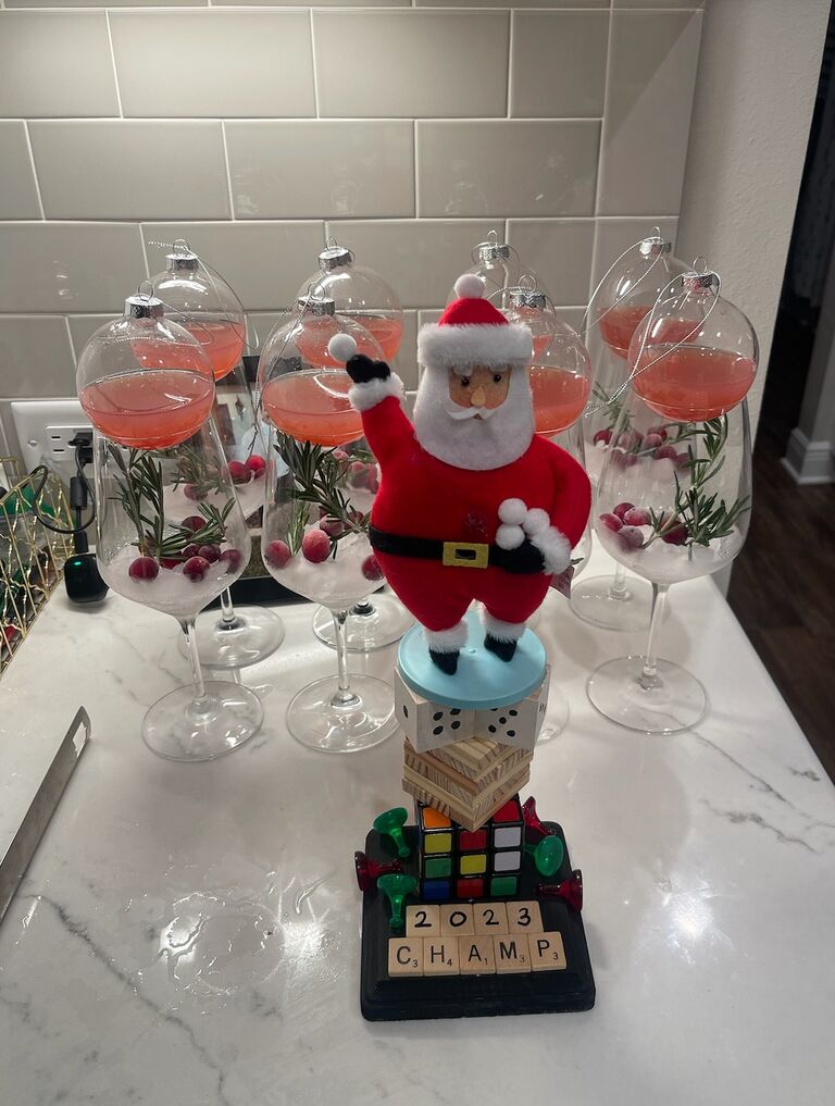 To honor Emily's love of games, they hosted their first annual Christmas Family Game Night. Two teams, a homemade trophy, lottery pranks, and a lot of competitiveness, made for a comical night! 