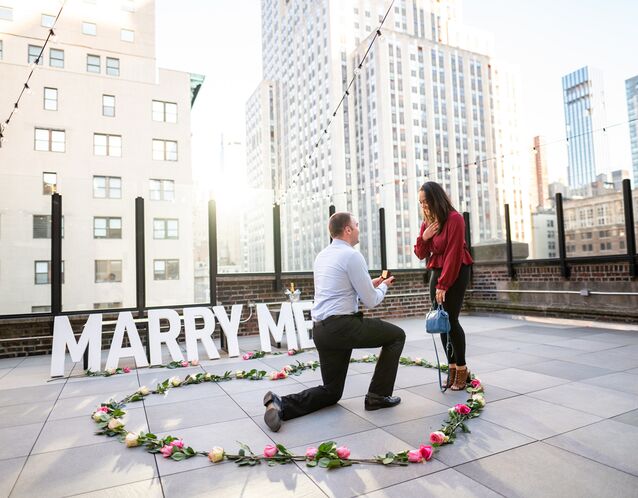 Marriage proposal on rooftop