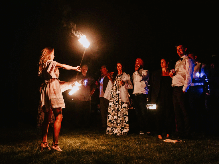 Fire spinning performance at a wedding reception.