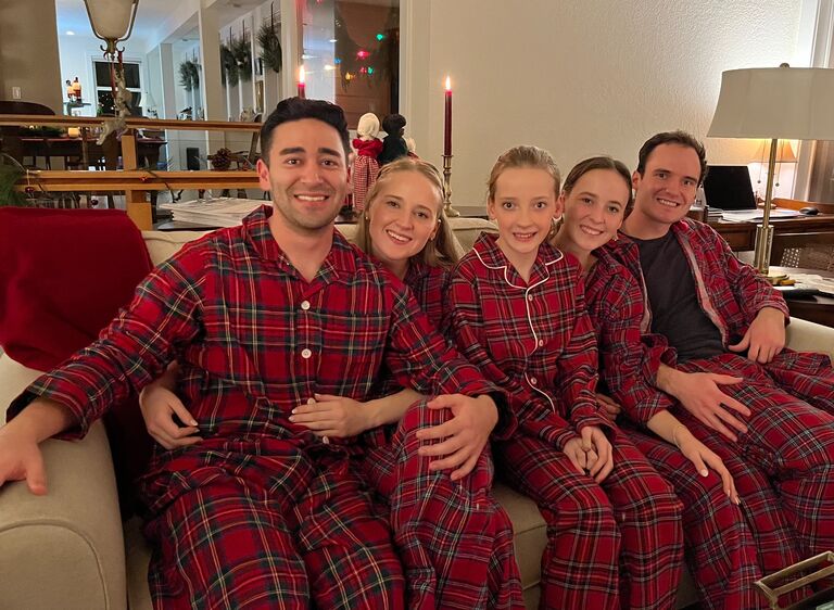 Mike gets his first pair of Lewis family Christmas jammies! The highest honor!