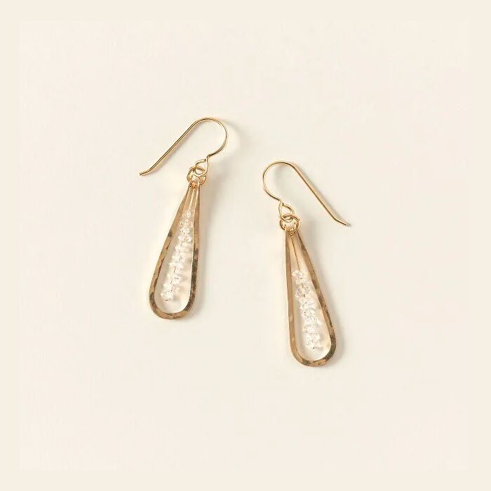 Raw diamond and gold earrings with curved backs