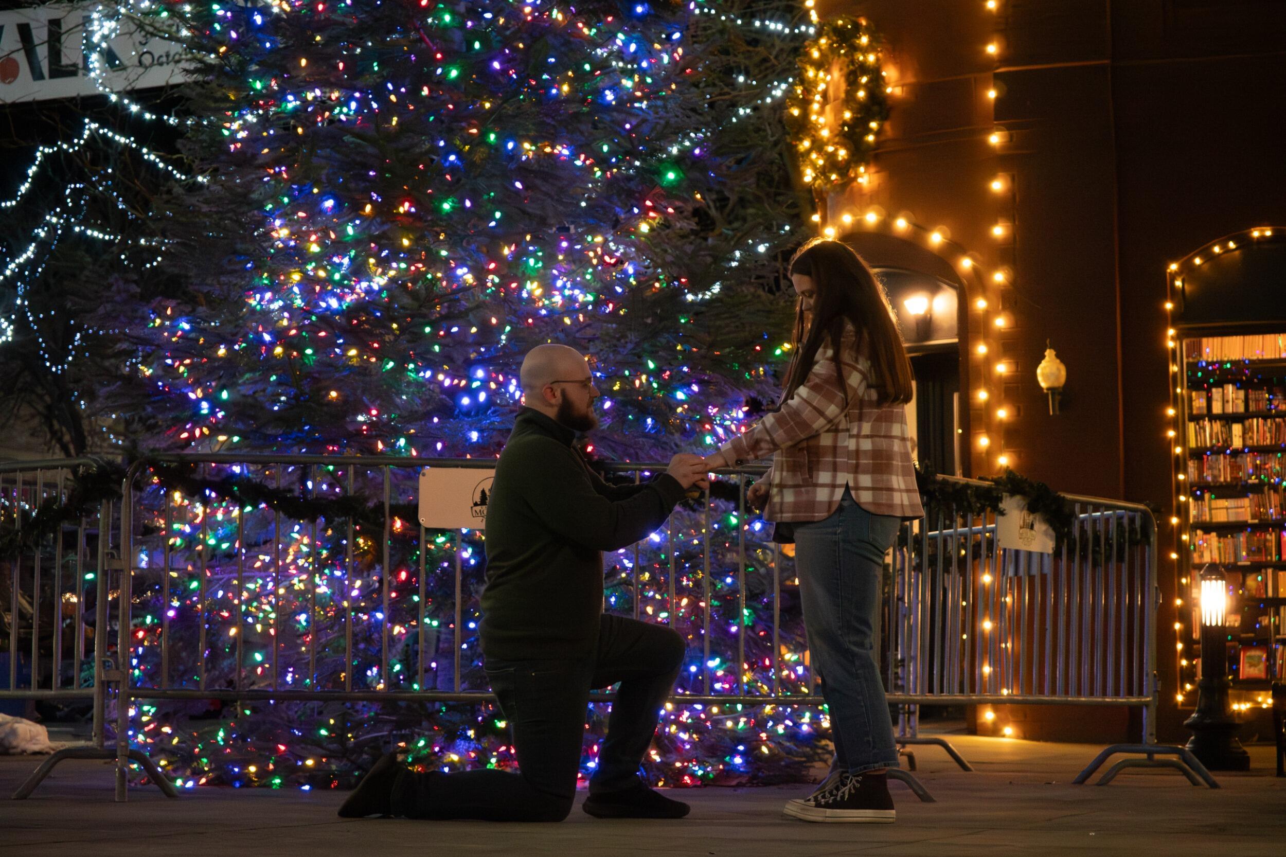 We went on the perfect holiday date that ended with a proposal in front of a lit-up Christmas tree. 