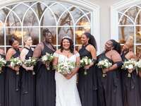 Bride with bridesmaids wearing matching earrings and bracelets