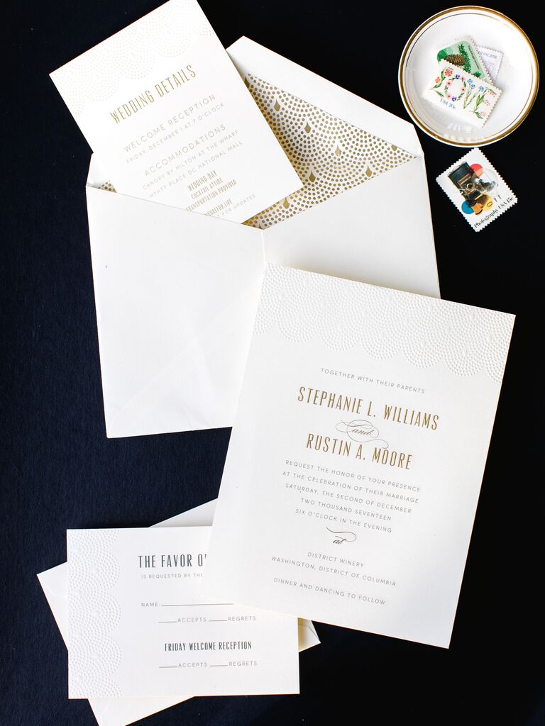 new year's eve wedding invitations with embossed gold lettering and scalloped gold envelope liner