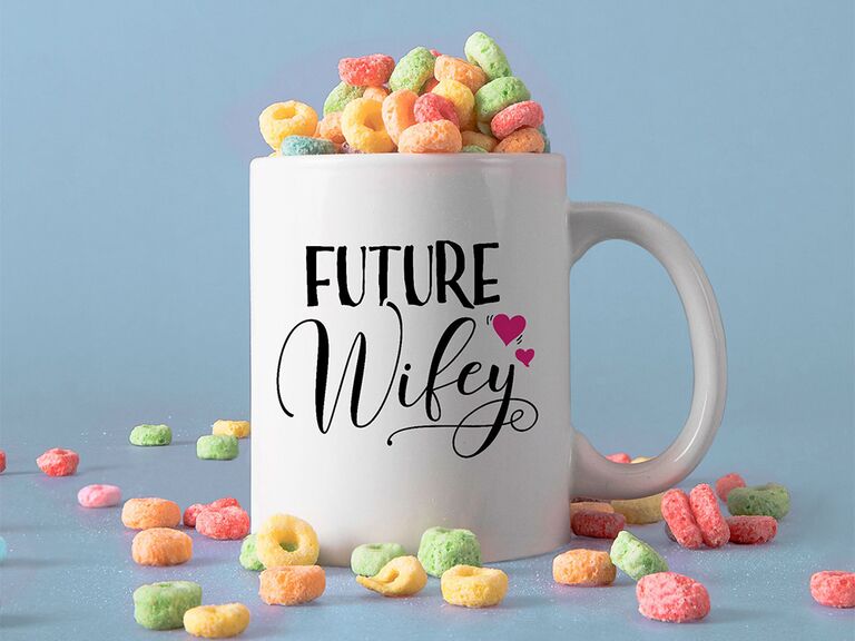 'Future wifey' in black type with two small pink hearts on white mug