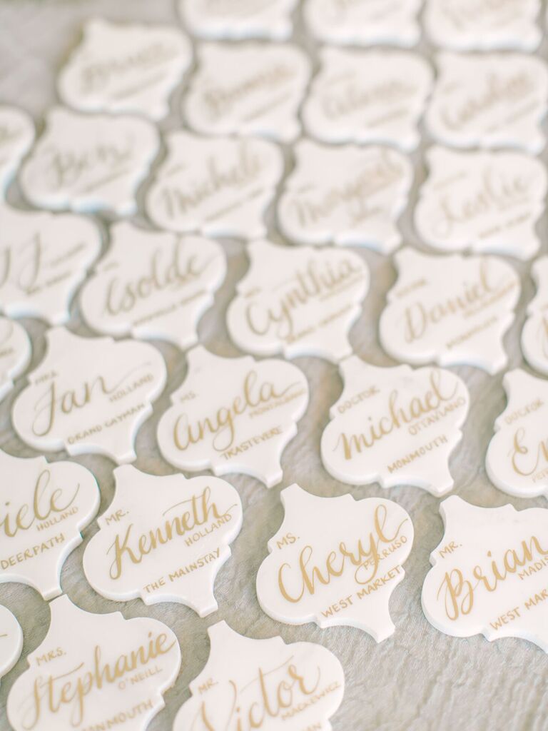 Calligraphed marble tile escort cards