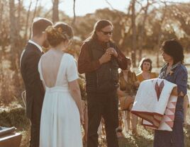 Officiant talking during Native American wedding