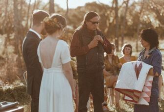 Officiant talking during Native American wedding