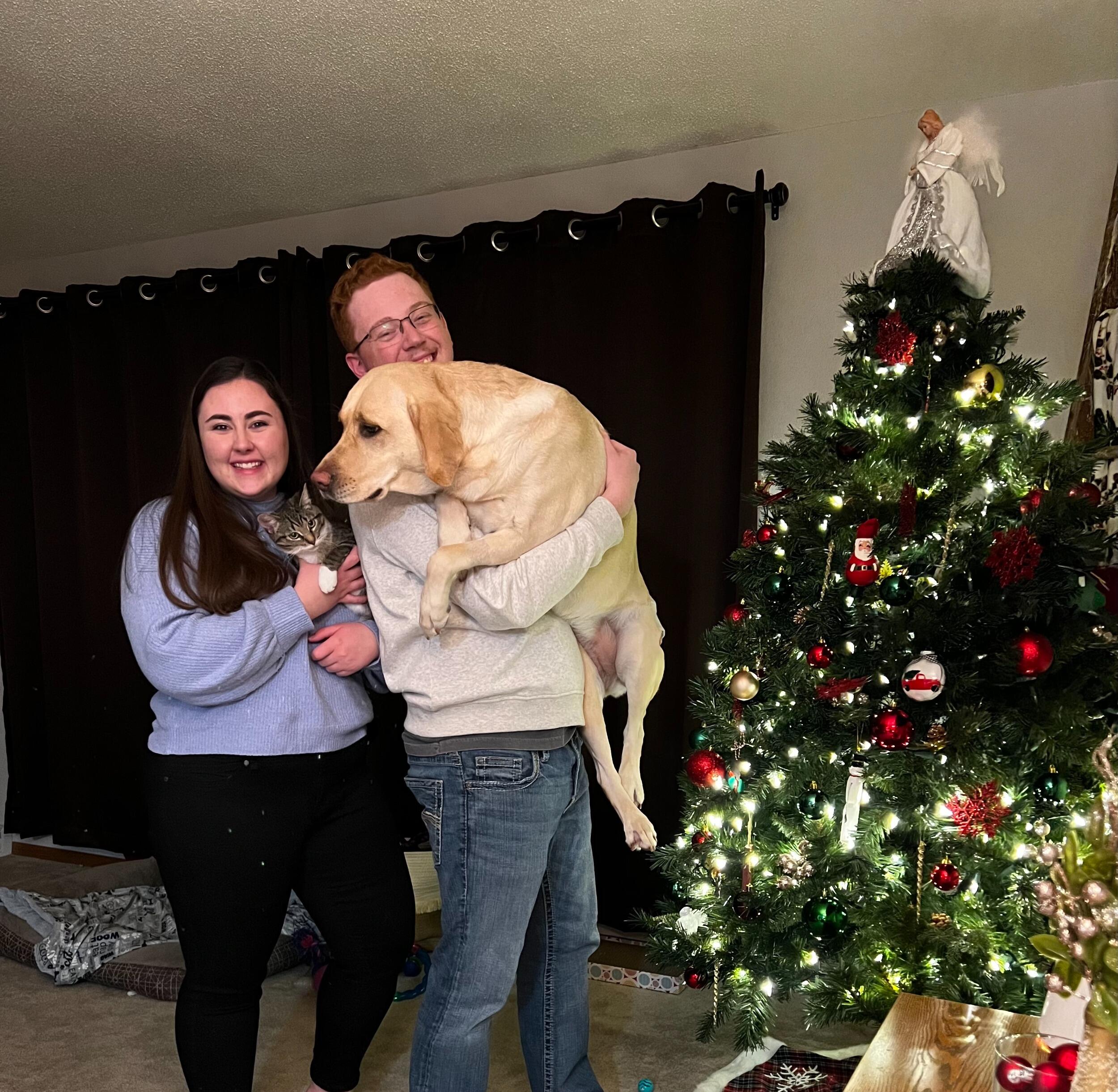 "Family picture" after Abbe's work Christmas party... Mazie was not a fan of her picture being taken. 