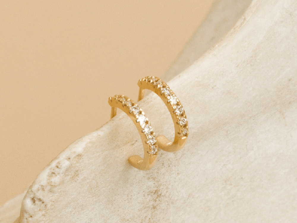 Gold huggie hoops with pavé diamonds