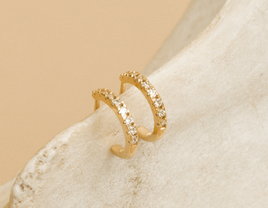 Gold huggie hoops with pavé diamonds