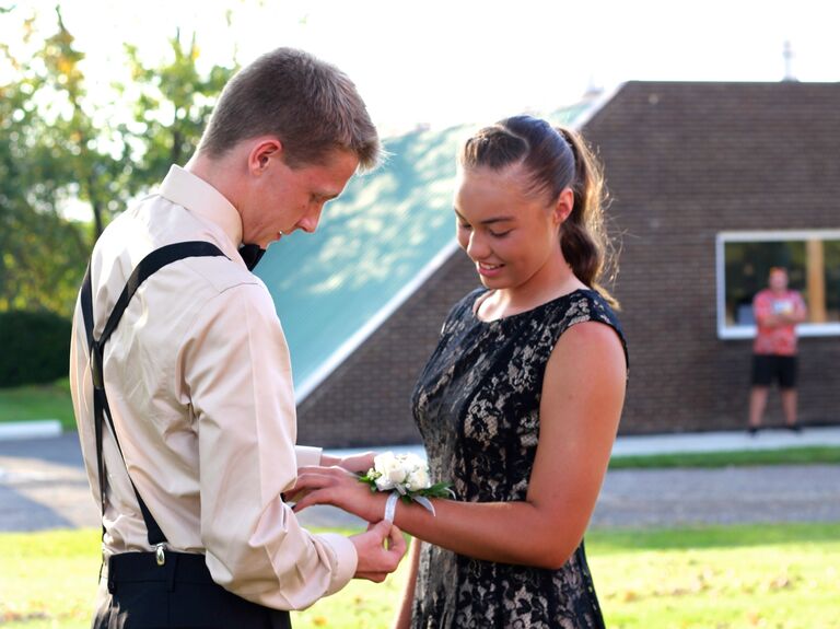 Robert "allowing" his daughter to be escorted to Homecoming.