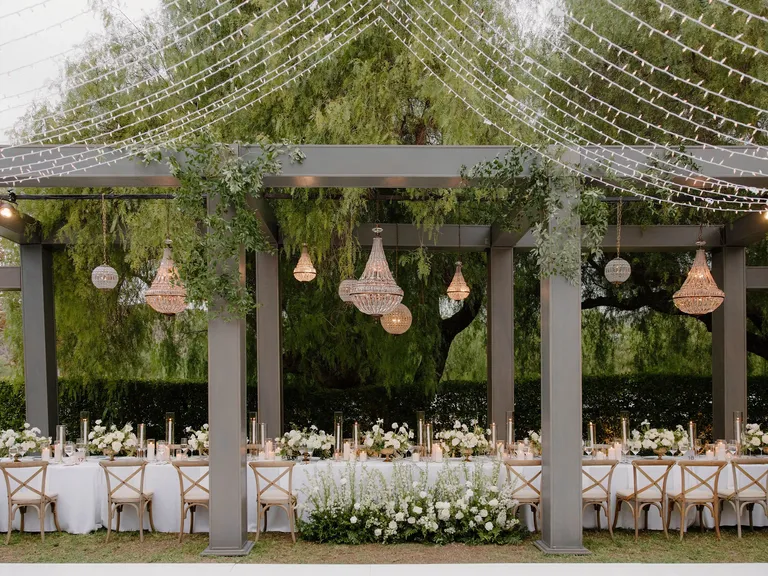 Garden reception under structure, taylor swift themed wedding