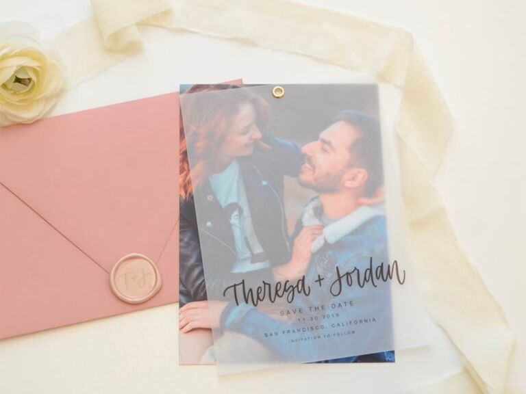 Clear overlay on personalized photo with couple's names in black script and event details