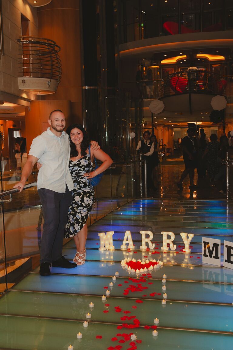 Benjamin proposed to Heather on the Liberty of the Seas Royal Carribbean ship in front of Heather's family. 