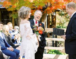 Couple laughing during vow exchange