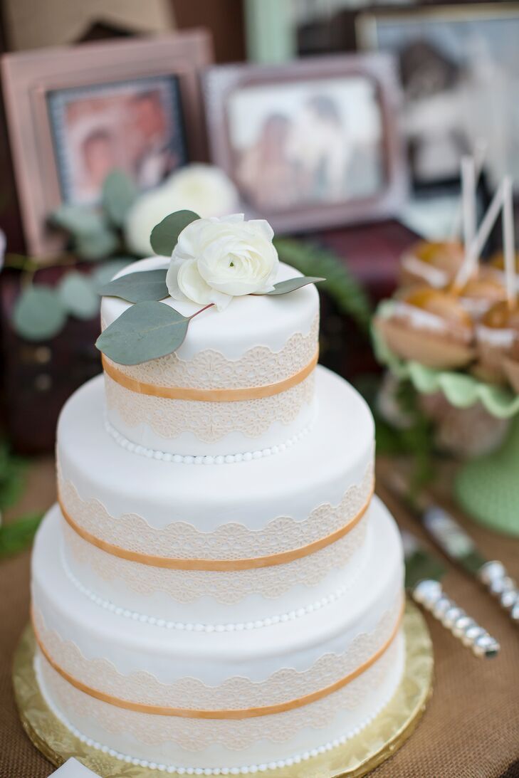 Tiered Wedding Cake With Orange Lace