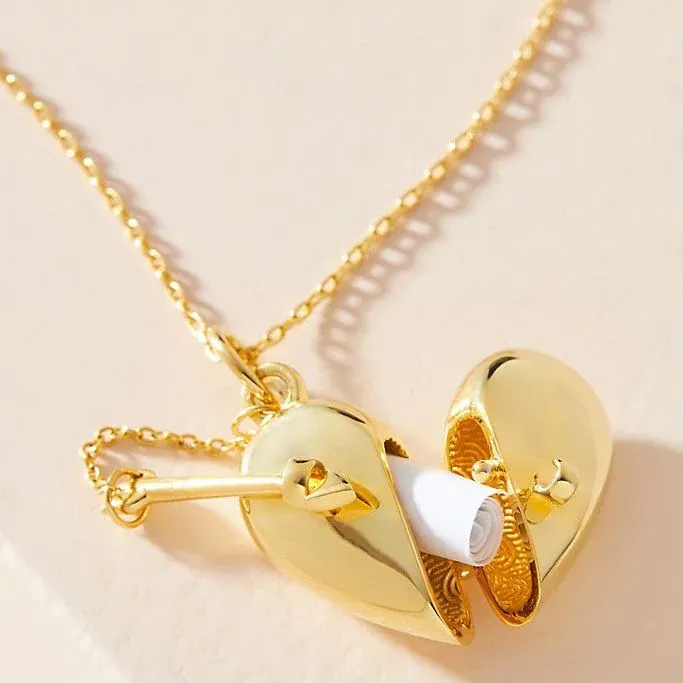 Heart and arrow locket necklace