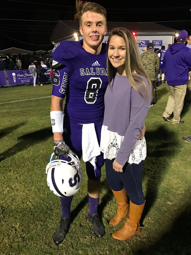 This was one of the first pictures Kris and Noah took together. Only a couple of days before Noah asked Kris to be his girlfriend on November 27, 2016. Noah was a freshman playing football and Kris was a sophomore cheering him on. 