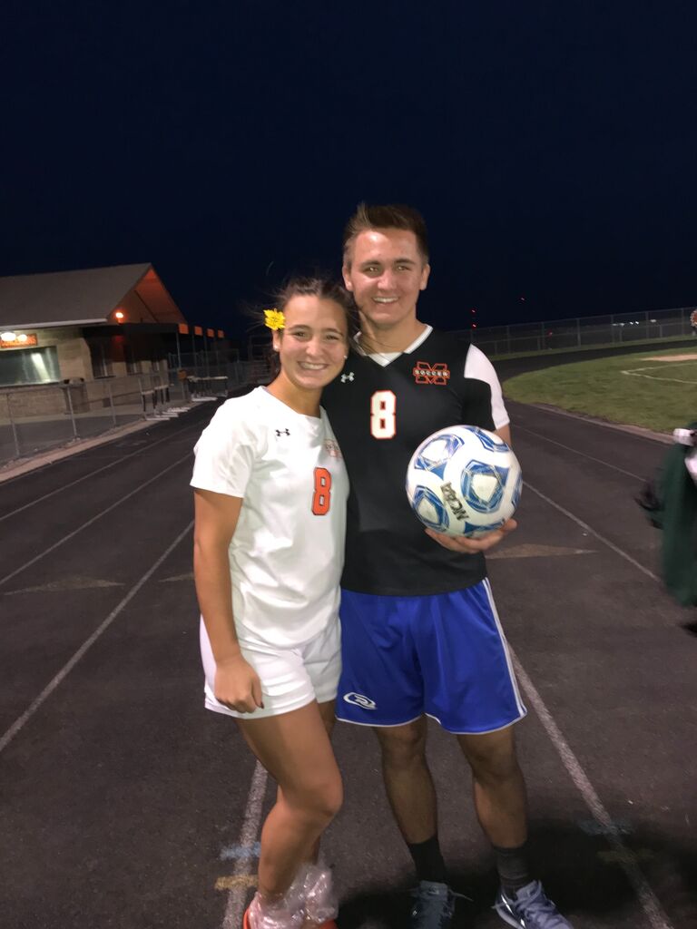 Erik brought me a flower and wore my away soccer jersey :)