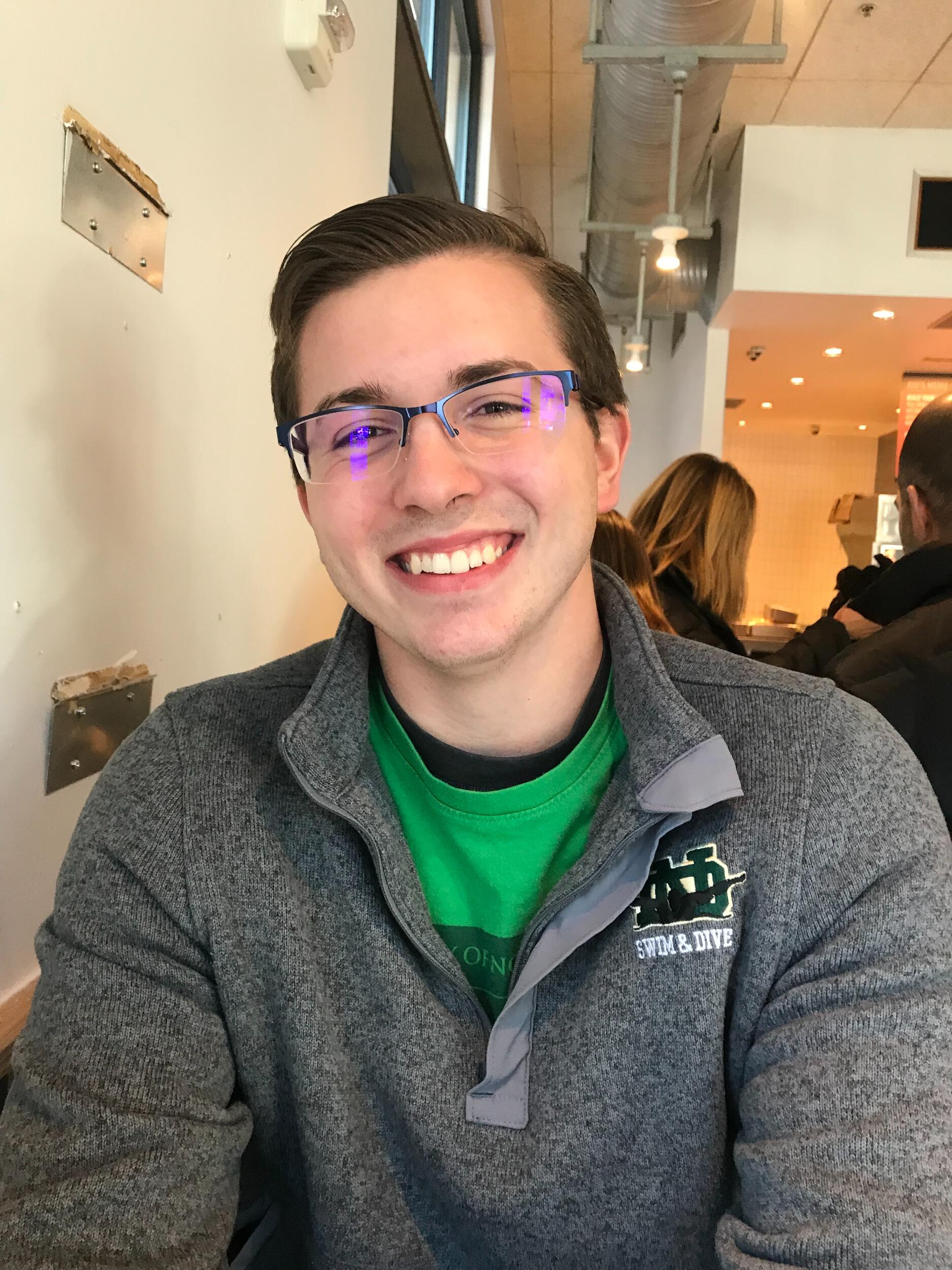 Proof that Charles can smile. Taken during our first date after I asked him out with the line "You were right".