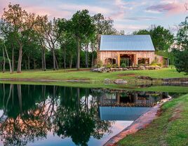 Lovely view of Esperanza Ranch beside a lake