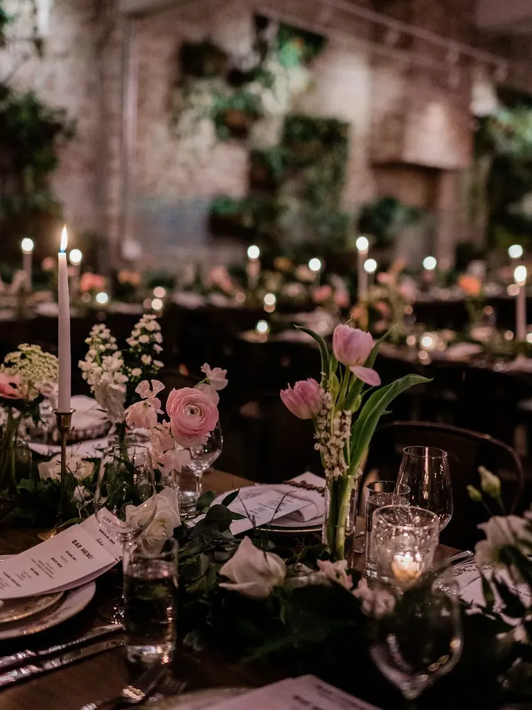 Dimly Lit Reception With Dark Linens, Candles and Minimalistic Blush Centerpieces